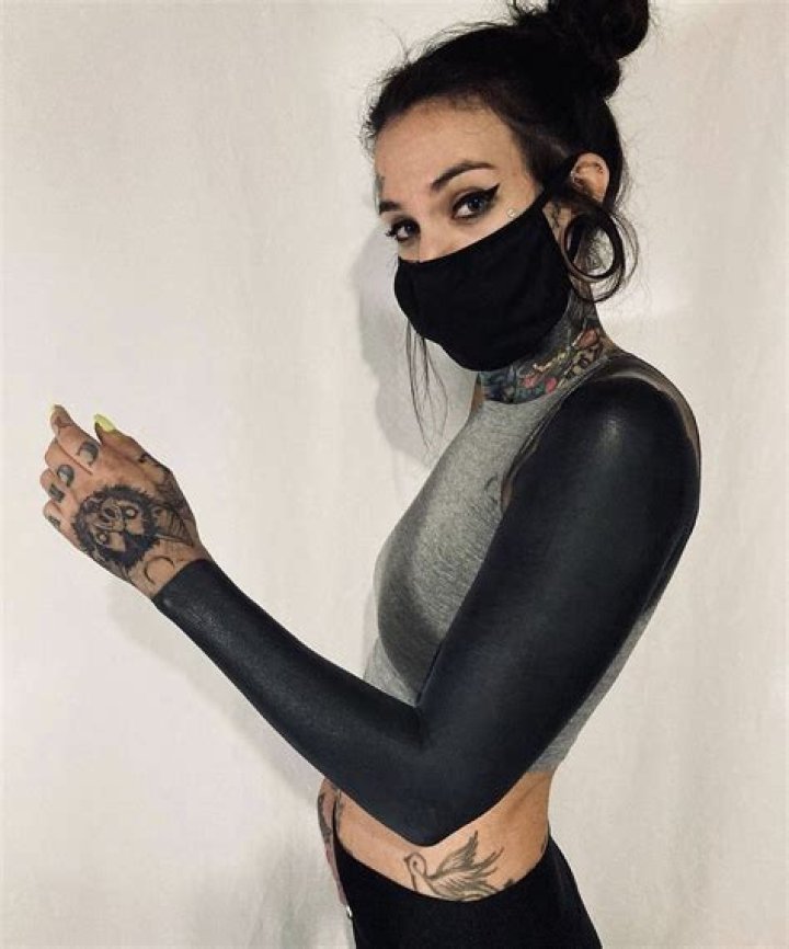 Exploring The Allure Of The Black Out Tattoo Girl
