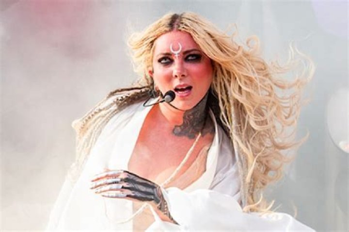 Meet The Enchanting Voice Behind In This Moment: Uncover The Talent